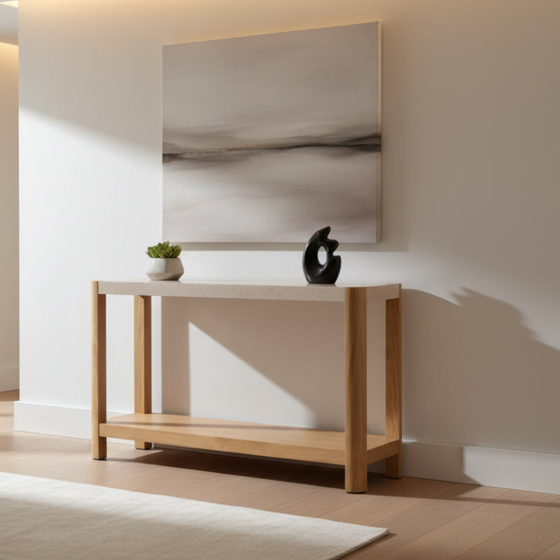 Wooden console table with a white top on a white background