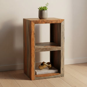 Wooden side table with three shelves on a white background