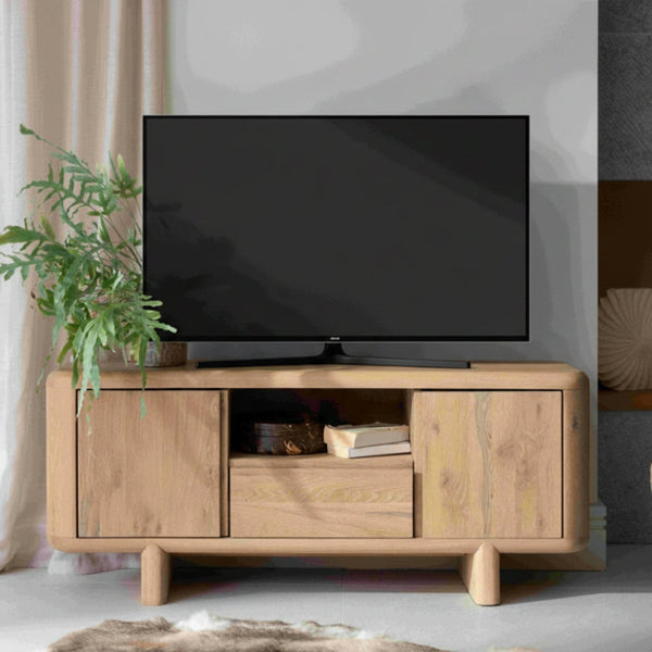 Wooden TV stand with a television on top in a room setting