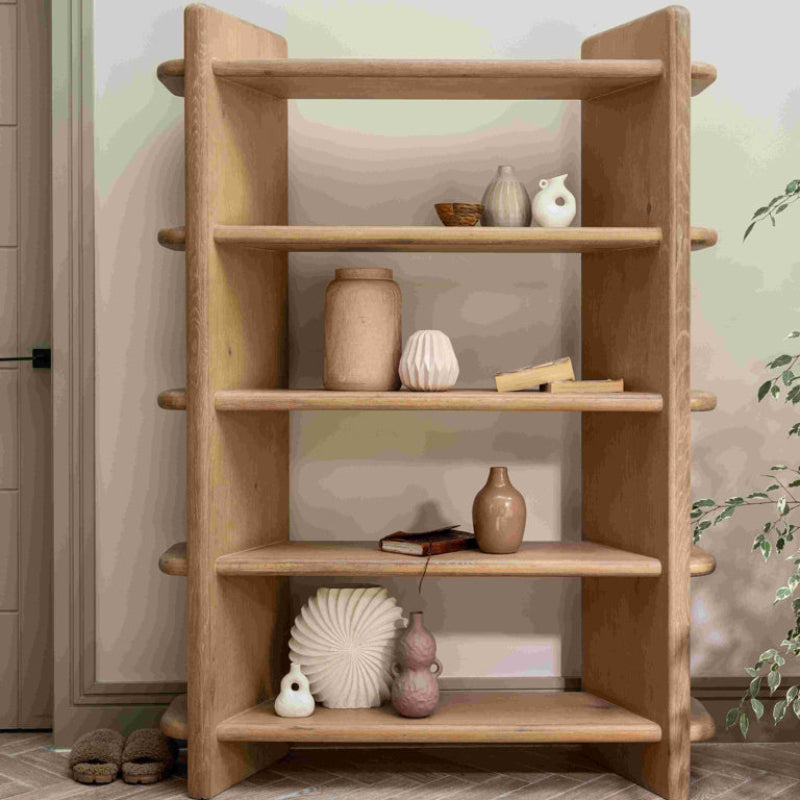 Wooden bookshelf with multiple shelves on a white background