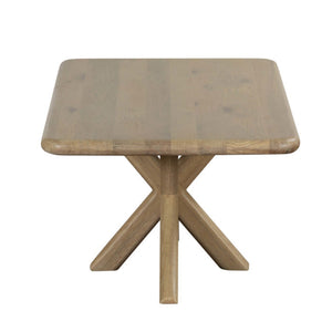 Wooden table with a square top and X-shaped legs on a white background
