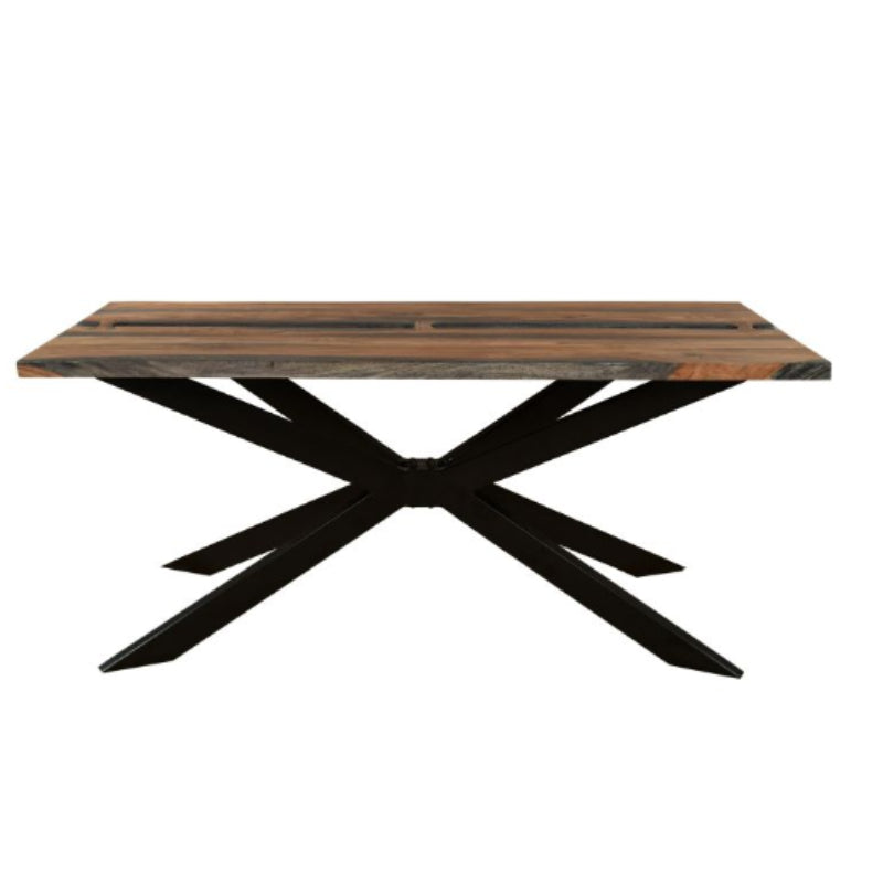 Wooden table with black metal X-shaped legs on a white background