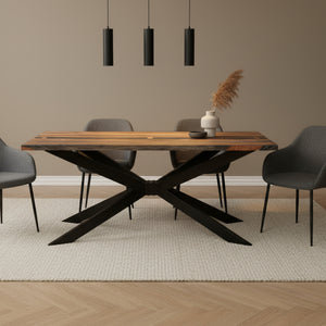 Wooden table with black metal X-shaped legs on a white background