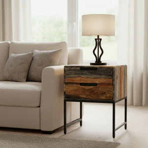 Wooden side table with 2 drawers in a living room setting
