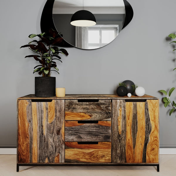Wooden sideboard with rustic design in a room with a mirror and plants.