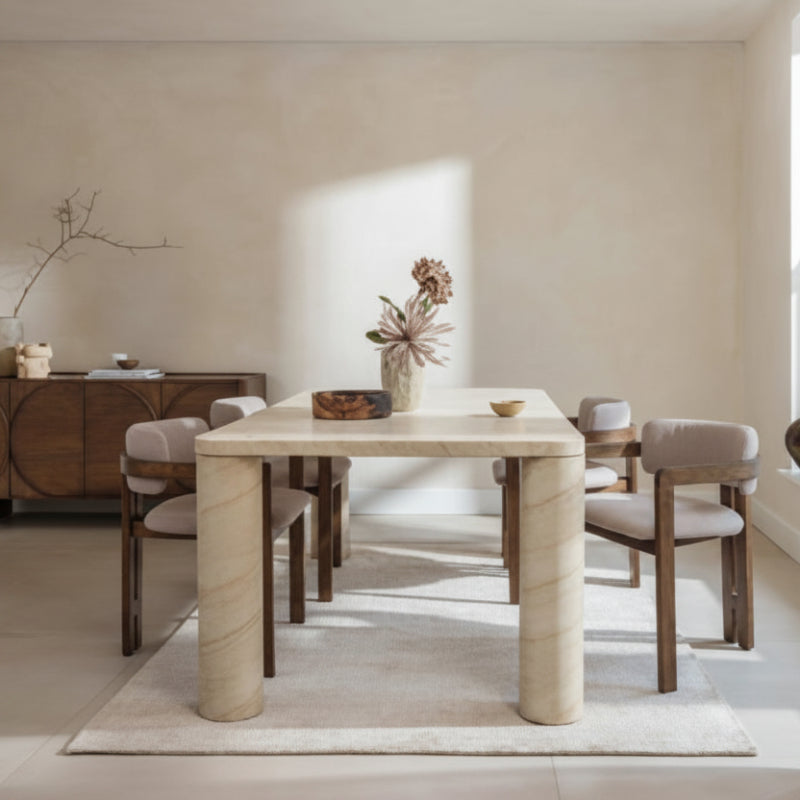 Beige wooden table with cylindrical legs on a white background