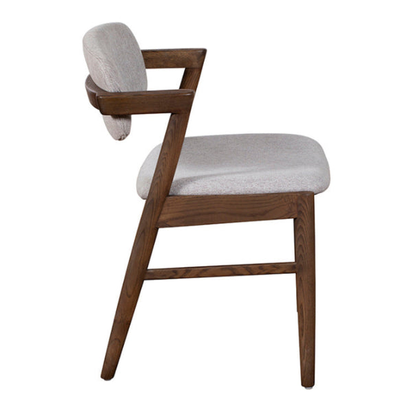 Wooden chair with gray cushioned seat and backrest on a white background