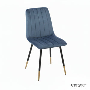 Blue velvet chair with black legs on a white background