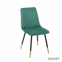 Green velvet chair with black and gold legs on a white background