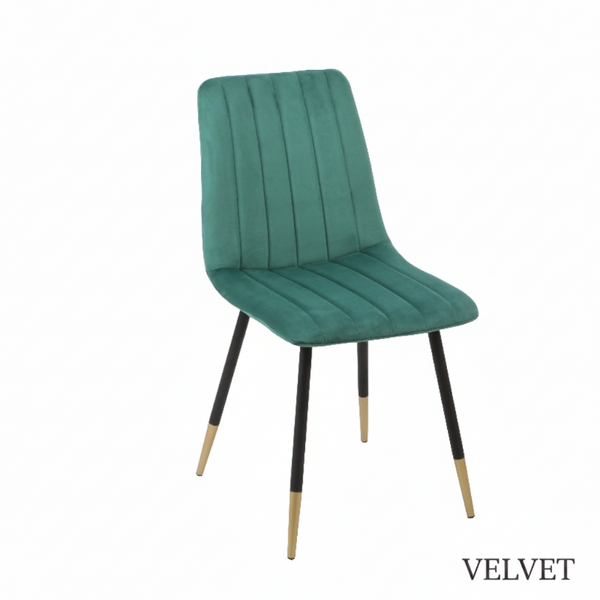 Green velvet chair with black and gold legs on a white background