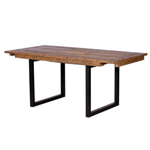 Wooden dining table with black metal legs on a white background