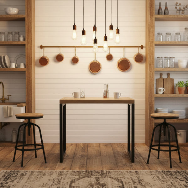 Table with wooden top and black metal legs with stools in a room setting