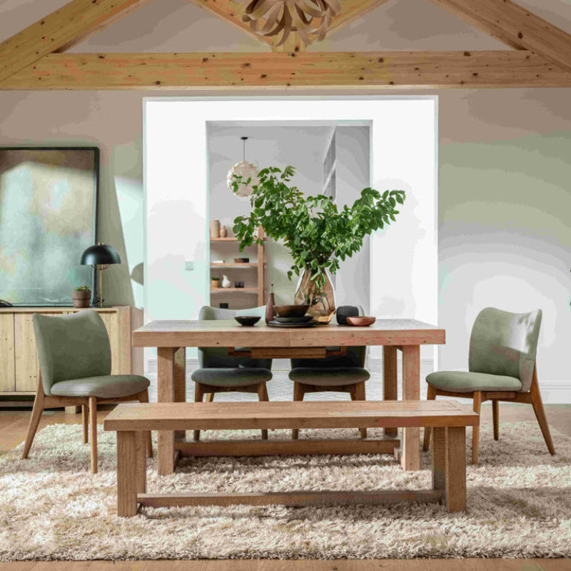 Wooden dining table on a white background