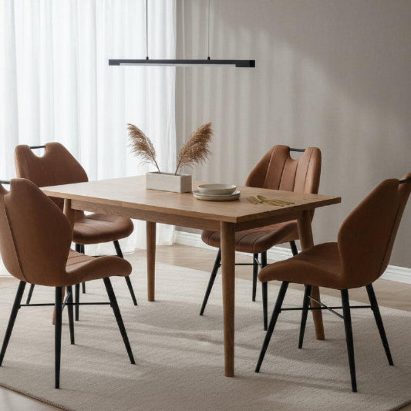 Brown upholstered chair with black legs on a white background