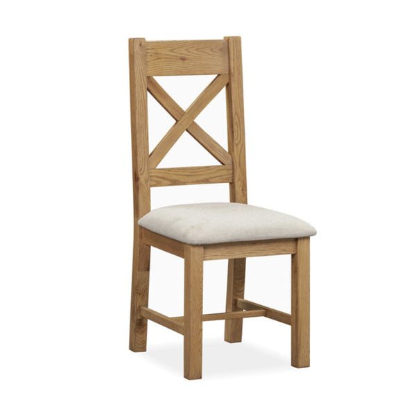 Wooden chair with a cushioned seat on a white background