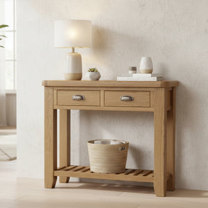 Wooden console table with two drawers on a white background