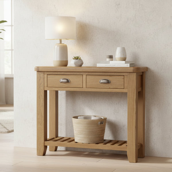 Wooden console table with two drawers on a white background