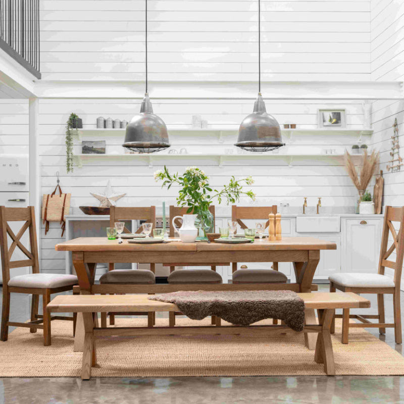Wooden dining table on a white background