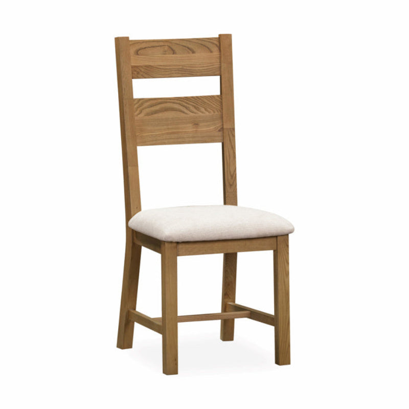 Wooden chair with a white cushion on a white background