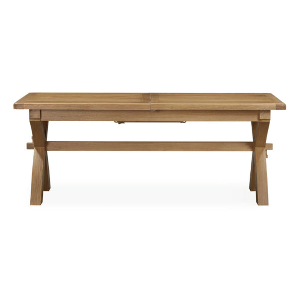 Wooden dining table on a white background
