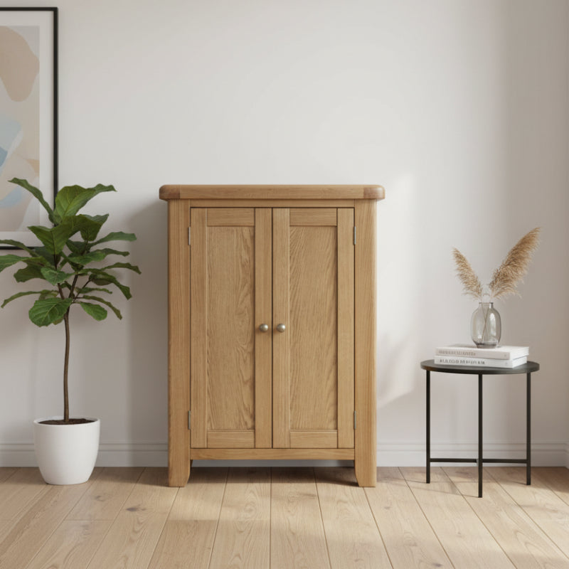 Wooden shoe cabinet with two doors on a white background