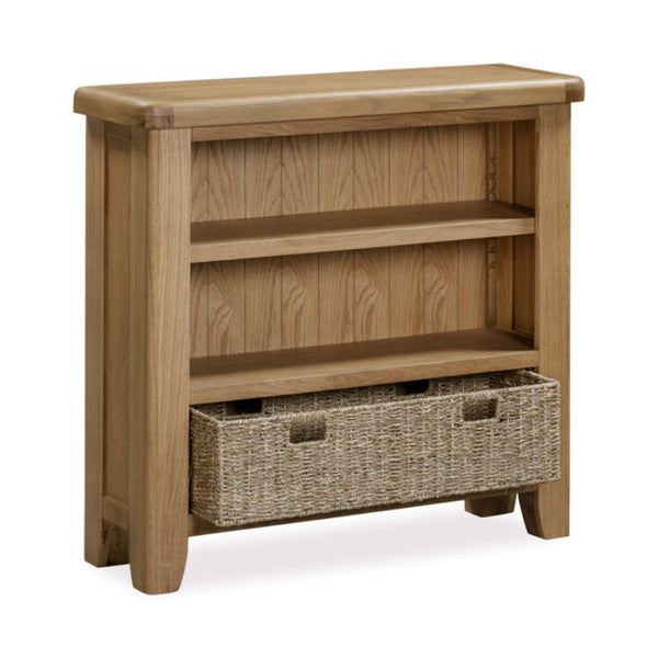 Wooden bookshelf with a basket on a white background