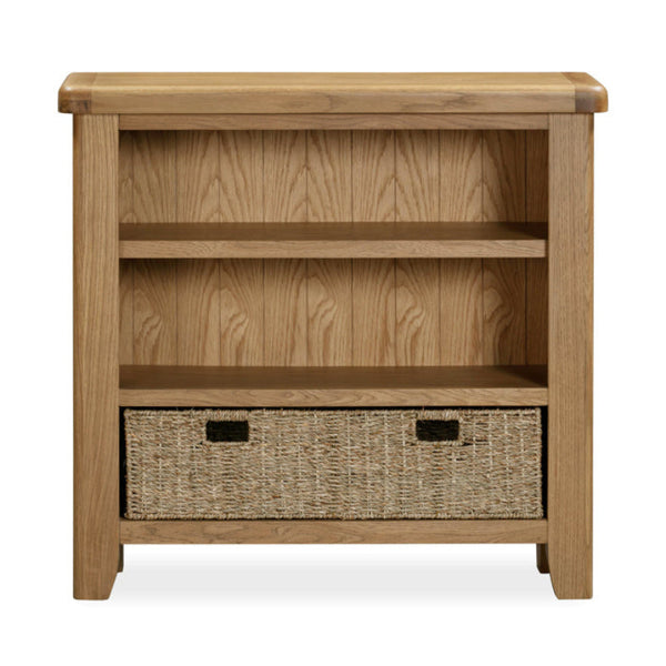 Wooden bookshelf with a woven basket on a white background