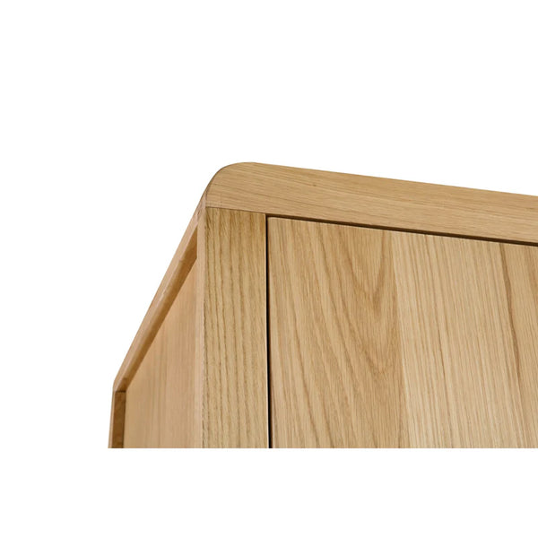 Close-up of a wooden surface with a visible grain pattern on a white background